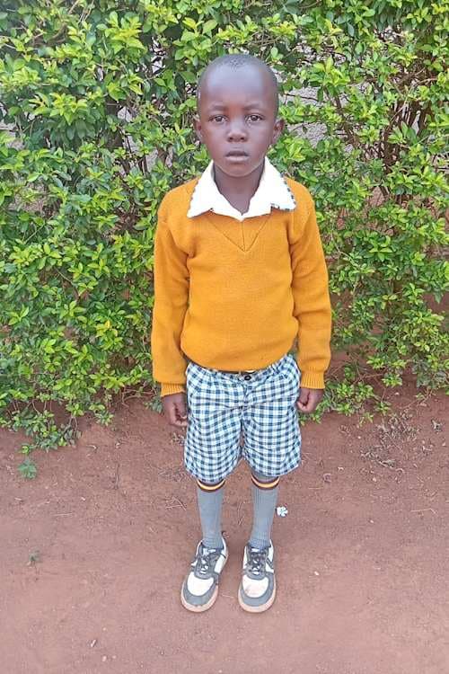 An unsponsored boy named Benedict from Kenya who lives in an AIDS-affected area and has waited 549 days for a sponsor.