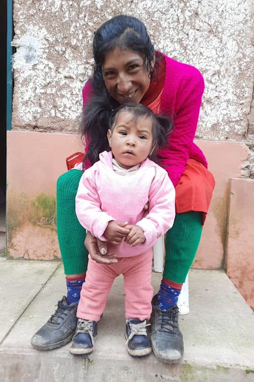 An unsponsored girl named Arunha from Peru who has waited 446 days for a sponsor.