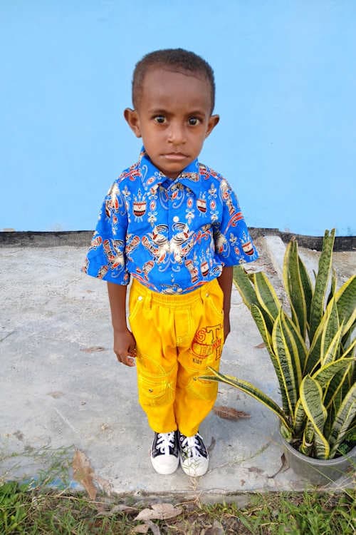 An unsponsored boy named Brian from Indonesia who has waited 505 days for a sponsor.