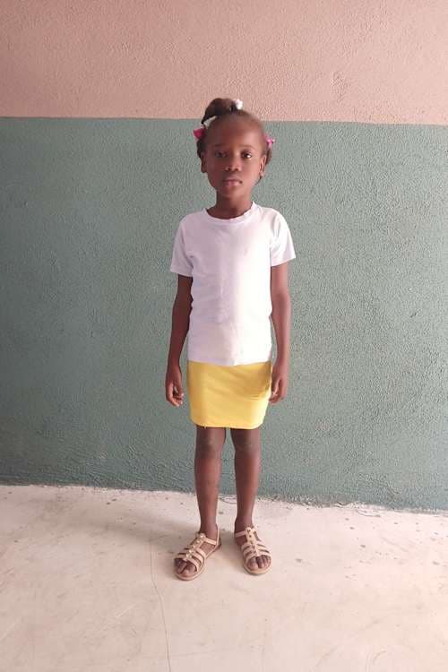 An unsponsored girl named Jeande from Haiti who is vulnerable to exploitation and has waited 427 days for a sponsor.