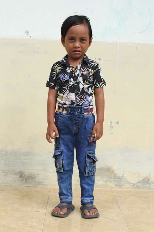An unsponsored boy named Alfino from Indonesia who has waited 439 days for a sponsor.