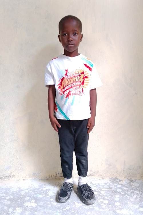 An unsponsored boy named Emmanuel from Haiti who is vulnerable to exploitation and has waited 469 days for a sponsor.