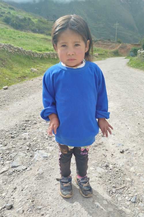 An unsponsored girl named Dayana from Peru who has waited 404 days for a sponsor.