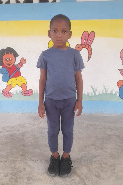 An unsponsored boy named Marc Olson from Haiti who is vulnerable to exploitation and has waited 452 days for a sponsor.