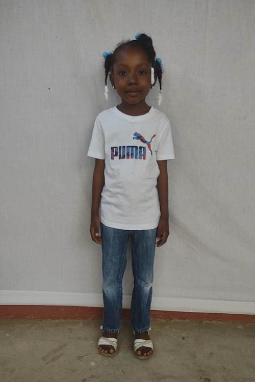 An unsponsored girl named Anounou from Haiti who is vulnerable to exploitation and has waited 417 days for a sponsor.