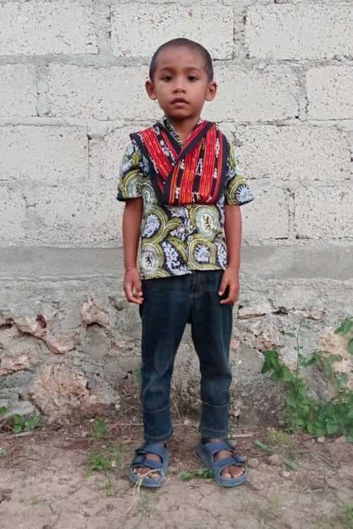 An unsponsored boy named Ahzarel from Indonesia who has waited 425 days for a sponsor.