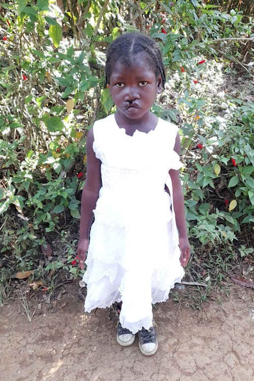 An unsponsored girl named Mirlande from Haiti who is vulnerable to exploitation and has waited 457 days for a sponsor.