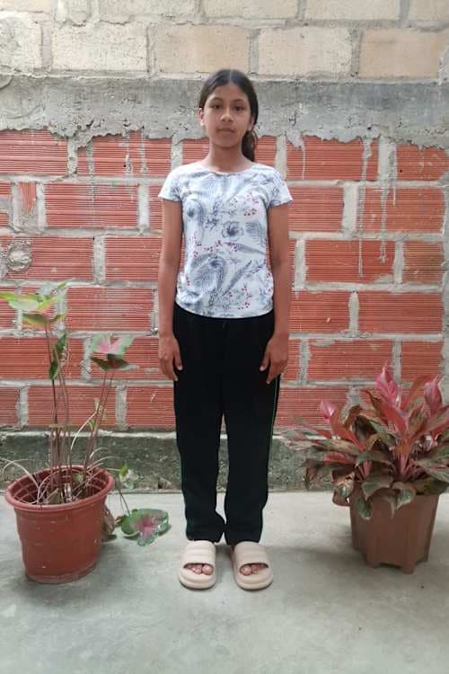 An unsponsored girl named Luz from Colombia who has waited 50 days for a sponsor.