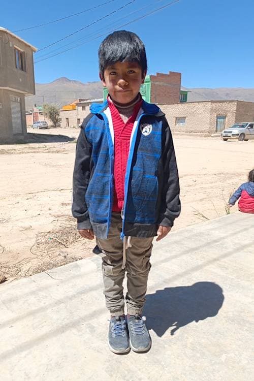 An unsponsored boy named Ezequiel from Bolivia who has waited 460 days for a sponsor.