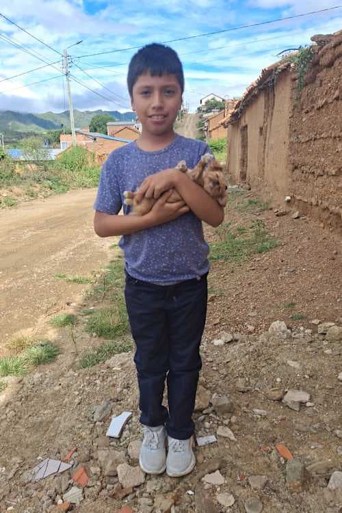 An unsponsored boy named Milan from Bolivia who has waited 467 days for a sponsor.