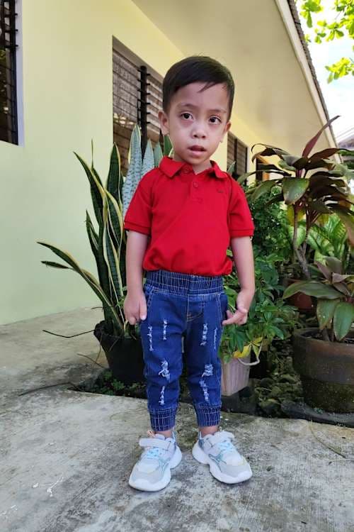An unsponsored boy named John-John from Philippines who has waited 378 days for a sponsor.