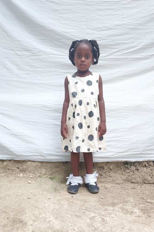 An unsponsored girl named Rosegaïcha from Haiti who is vulnerable to exploitation and has waited 423 days for a sponsor.