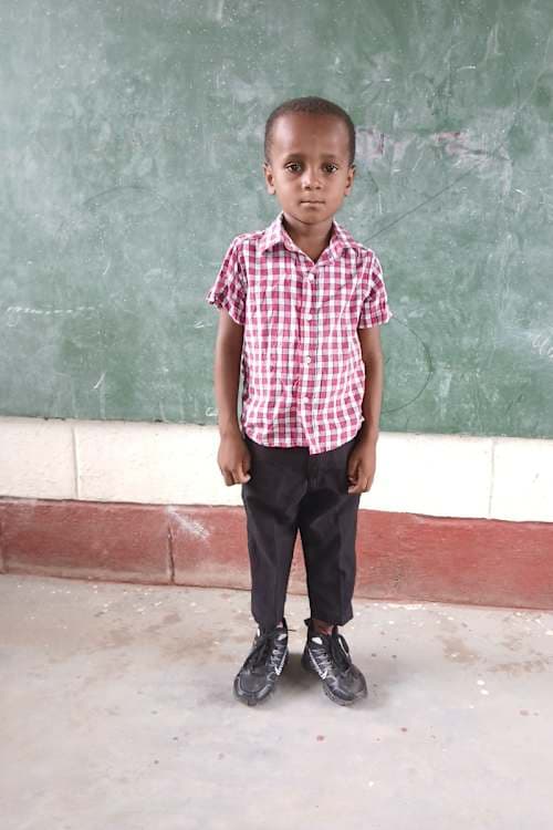 An unsponsored boy named Minackson from Haiti who is vulnerable to exploitation and has waited 393 days for a sponsor.
