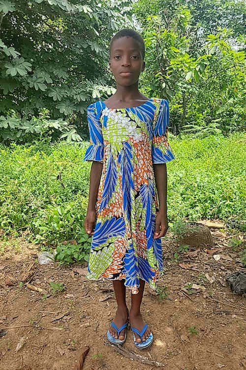 An unsponsored girl named Marceline from Togo who lives in an AIDS-affected area, is vulnerable to exploitation and has waited 390 days for a sponsor.