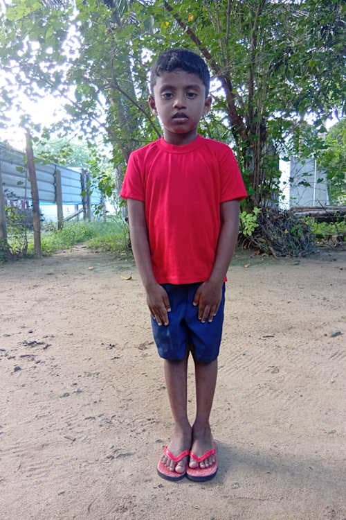 An unsponsored boy named Sasvin from Sri Lanka who has waited 431 days for a sponsor.