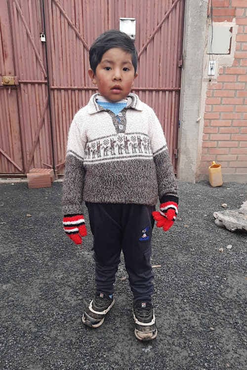 An unsponsored boy named Adriel from Bolivia who has waited 600 days for a sponsor.