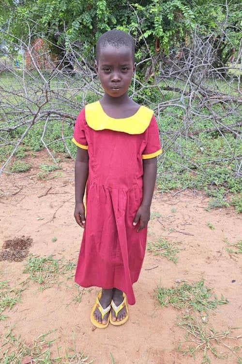 An unsponsored girl named Melania from Tanzania who lives in an AIDS-affected area, is vulnerable to exploitation and has waited 389 days for a sponsor.