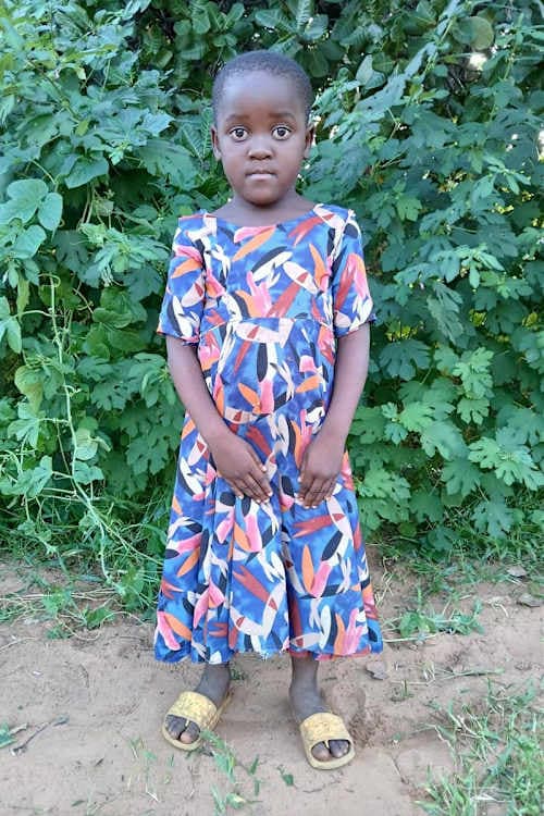 An unsponsored girl named Karen from Tanzania who lives in an AIDS-affected area, is vulnerable to exploitation and has waited 454 days for a sponsor.