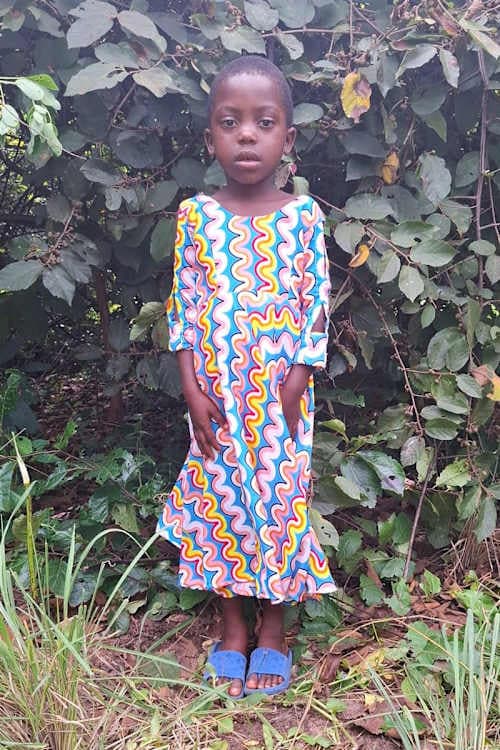 An unsponsored girl named Emigna from Tanzania who lives in an AIDS-affected area, is vulnerable to exploitation and has waited 388 days for a sponsor.