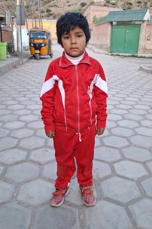 An unsponsored boy named Moises from Bolivia who has waited 438 days for a sponsor.