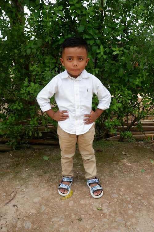 An unsponsored boy named Elvan from Indonesia who has waited 363 days for a sponsor.