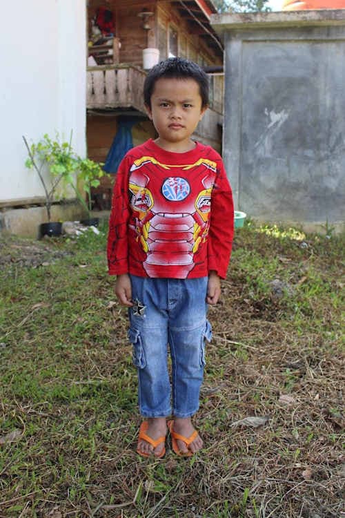 An unsponsored boy named Geva from Indonesia who has waited 388 days for a sponsor.