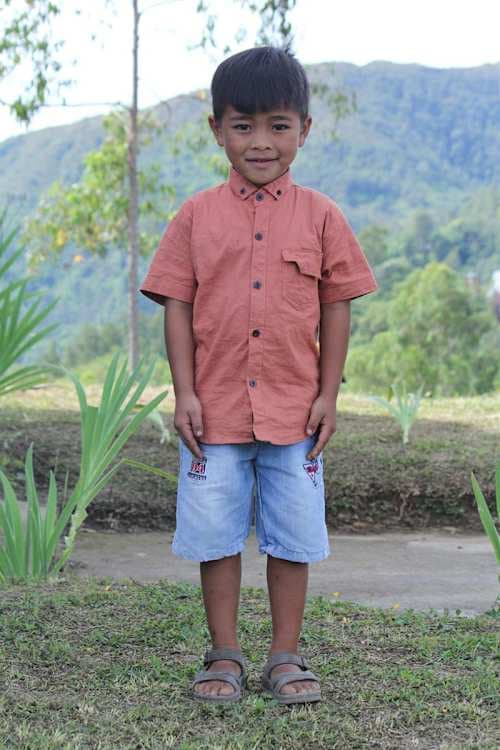An unsponsored boy named Riel from Indonesia who has waited 388 days for a sponsor.