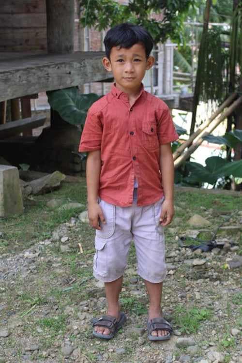 An unsponsored boy named Jonea from Indonesia who has waited 385 days for a sponsor.