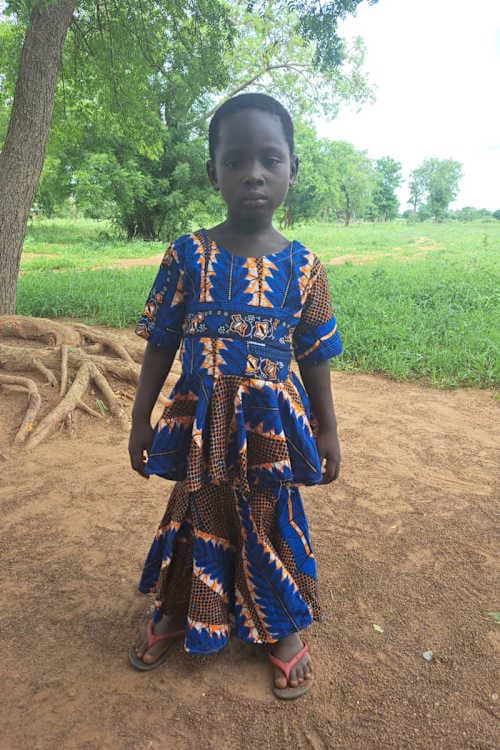 An unsponsored girl named Ngeibe from Ghana who lives in an AIDS-affected area and has waited 335 days for a sponsor.