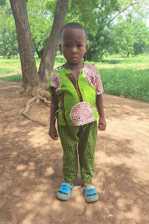 An unsponsored boy named Bakasoami from Ghana who lives in an AIDS-affected area and has waited 335 days for a sponsor.