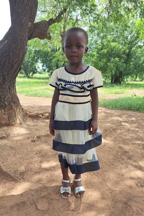 An unsponsored girl named Davina from Ghana who lives in an AIDS-affected area and has waited 335 days for a sponsor.
