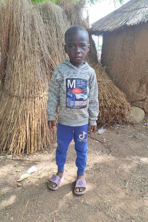 An unsponsored boy named Christopher from Ghana who lives in an AIDS-affected area and has waited 402 days for a sponsor.
