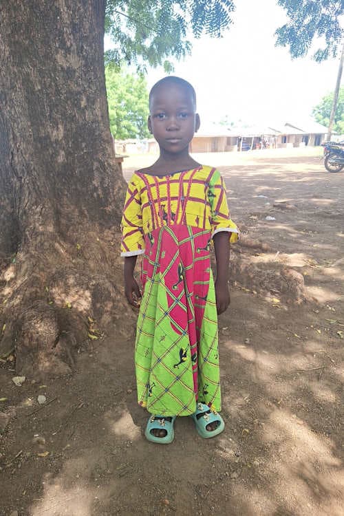 An unsponsored girl named Sakinatu from Ghana who lives in an AIDS-affected area and has waited 402 days for a sponsor.