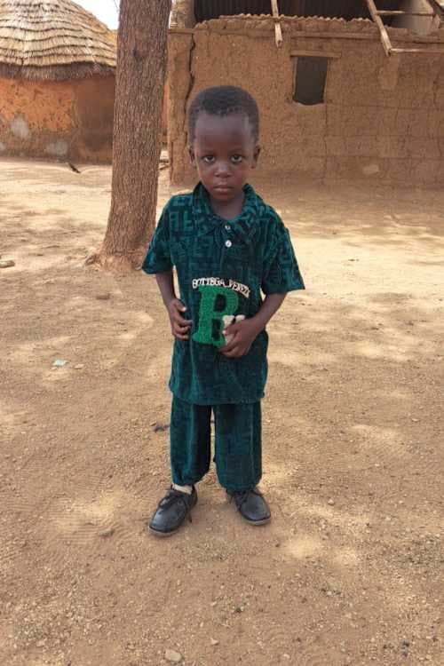 An unsponsored boy named Fusheni from Ghana who lives in an AIDS-affected area and has waited 342 days for a sponsor.