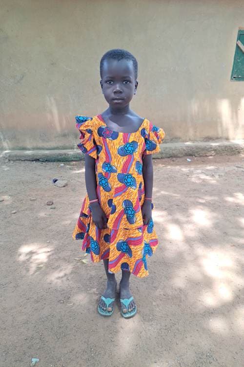 An unsponsored girl named Kenbiche from Ghana who lives in an AIDS-affected area and has waited 347 days for a sponsor.
