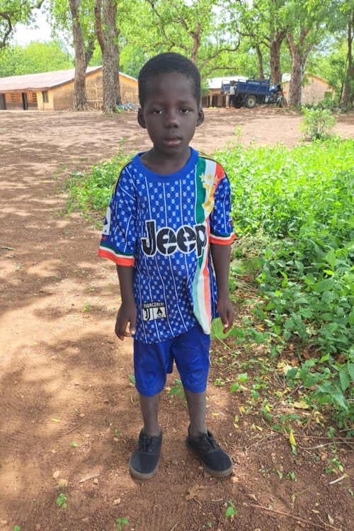 An unsponsored boy named Nyanyikina from Ghana who lives in an AIDS-affected area and has waited 430 days for a sponsor.