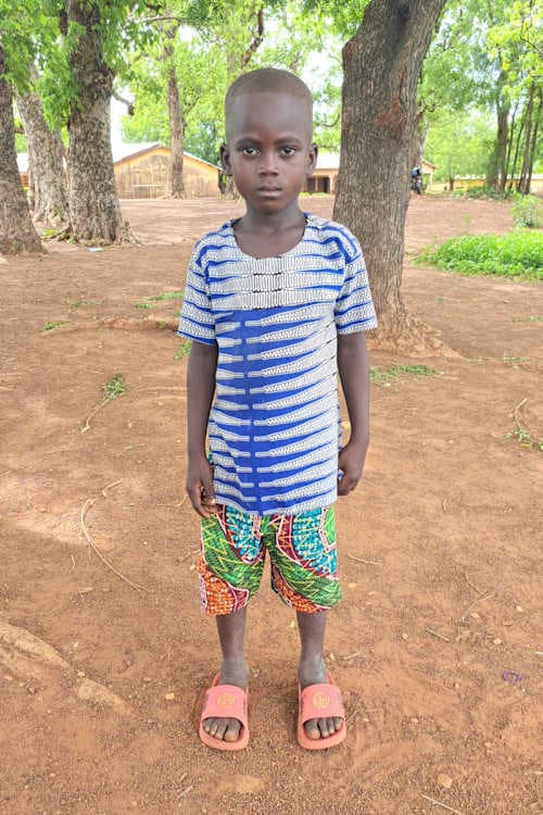 An unsponsored boy named Nkunyom from Ghana who lives in an AIDS-affected area and has waited 430 days for a sponsor.