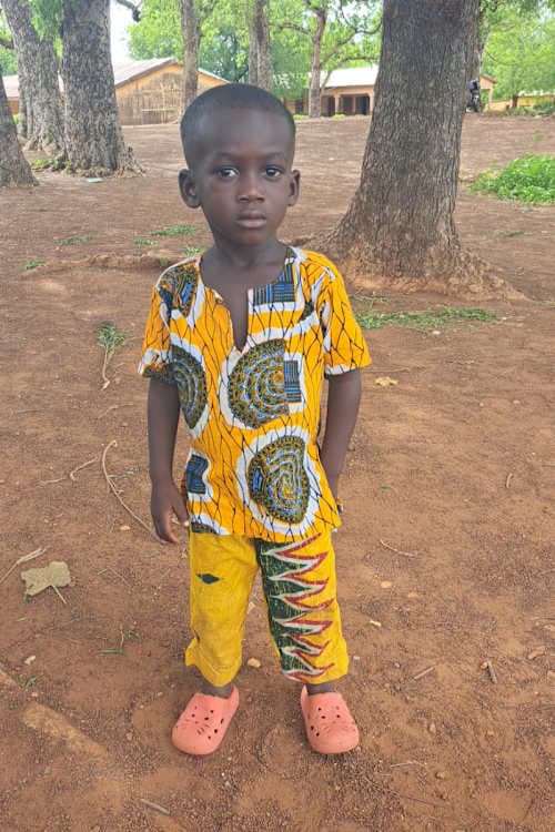 An unsponsored boy named Tinyangmache from Ghana who lives in an AIDS-affected area and has waited 430 days for a sponsor.