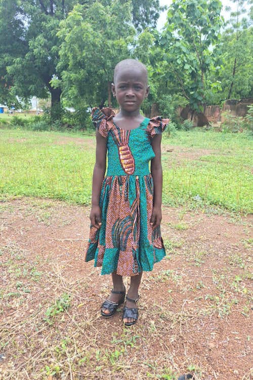 An unsponsored girl named Davina from Ghana who lives in an AIDS-affected area and has waited 336 days for a sponsor.