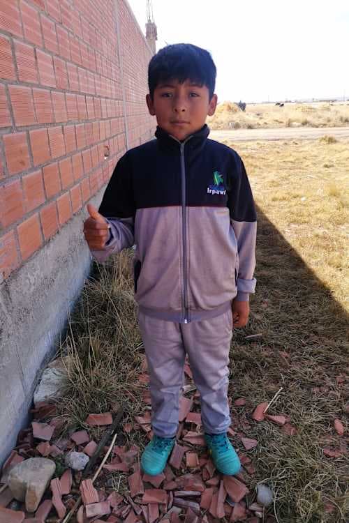 An unsponsored boy named Melvin from Bolivia who has waited 404 days for a sponsor.