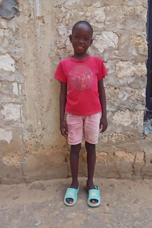 An unsponsored boy named Fondo from Kenya who lives in an AIDS-affected area and has waited 585 days for a sponsor.