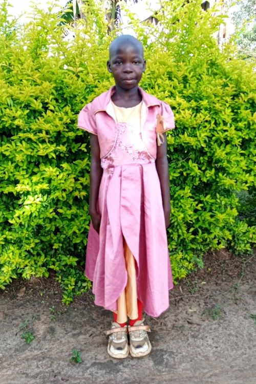 An unsponsored girl named Angom from Uganda who lives in an AIDS-affected area, is vulnerable to exploitation and has waited 480 days for a sponsor.