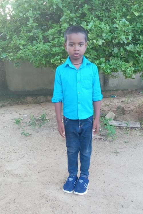 An unsponsored boy named Thuvi from Sri Lanka who has waited 577 days for a sponsor.
