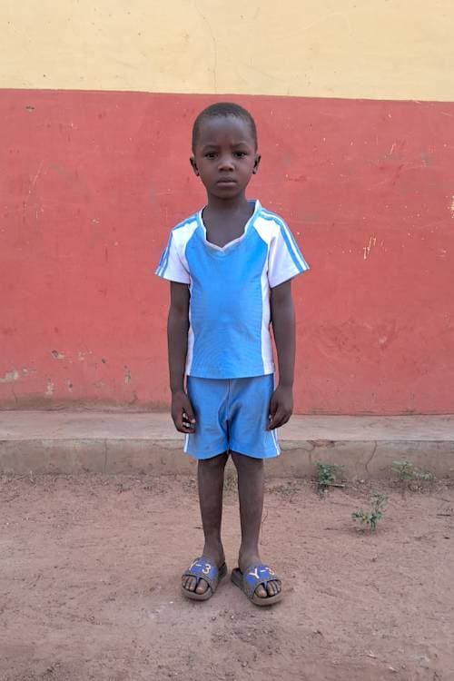 An unsponsored boy named Mbitilati from Ghana who lives in an AIDS-affected area and has waited 382 days for a sponsor.