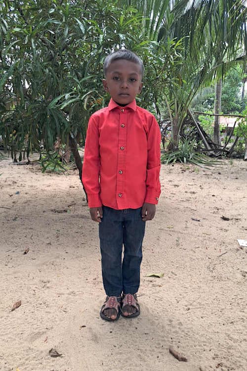 An unsponsored boy named Janustan from Sri Lanka who has waited 573 days for a sponsor.
