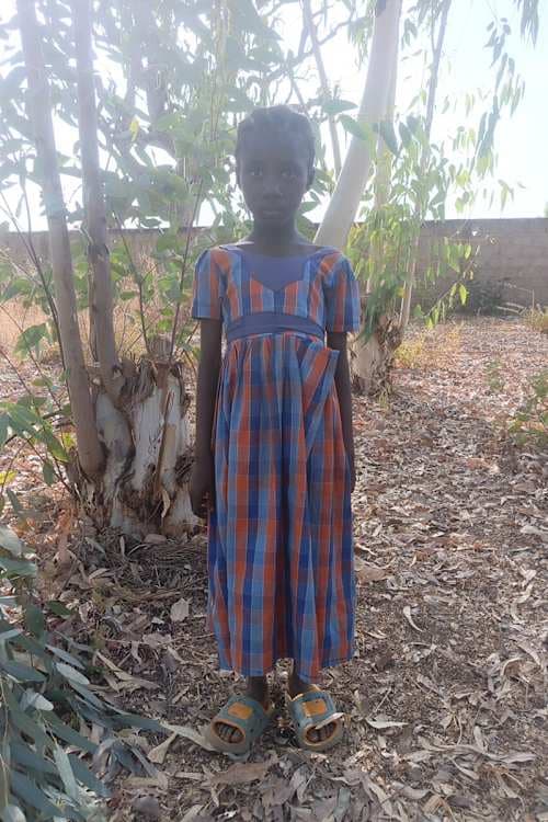 An unsponsored girl named Augustine from Burkina Faso who lives in an AIDS-affected area, is vulnerable to exploitation and has waited 496 days for a sponsor.