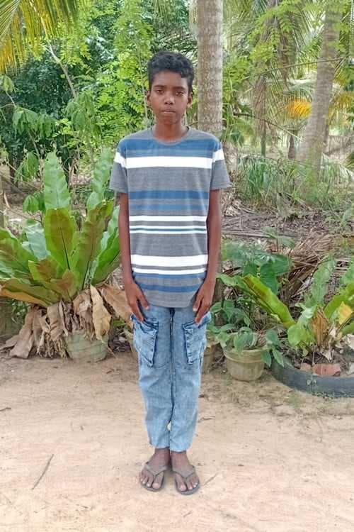 An unsponsored boy named Hepshan from Sri Lanka who has waited 499 days for a sponsor.