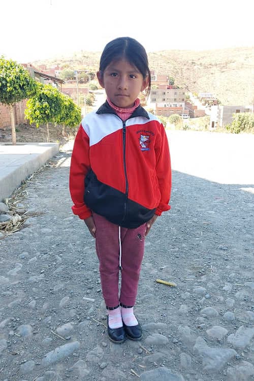 An unsponsored girl named Anahi from Bolivia who has waited 582 days for a sponsor.
