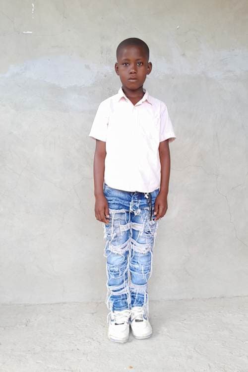 An unsponsored boy named Holdwens from Haiti who is vulnerable to exploitation and has waited 549 days for a sponsor.