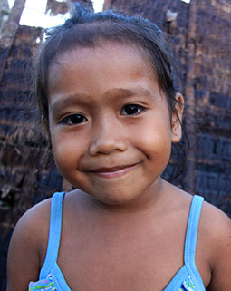 A young girl close-up, smiling